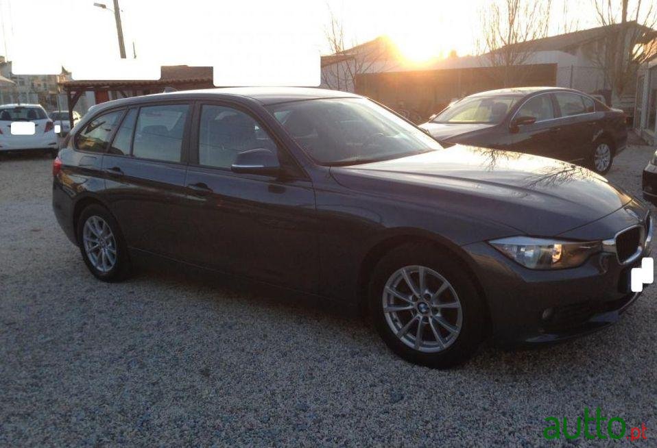 2012' BMW 320 D Touring Navigation photo #2