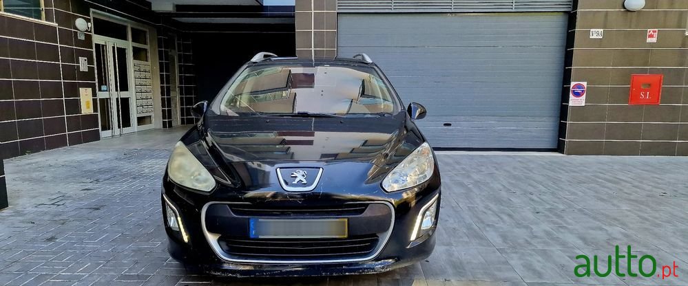 2012' Peugeot 308 Sw photo #2