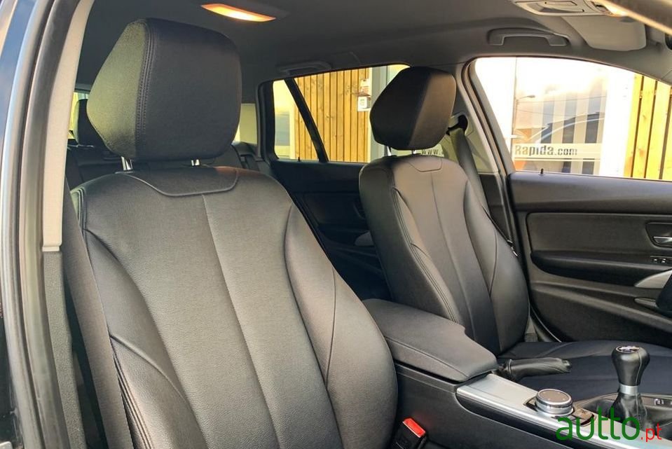 2015' BMW 318 photo #6