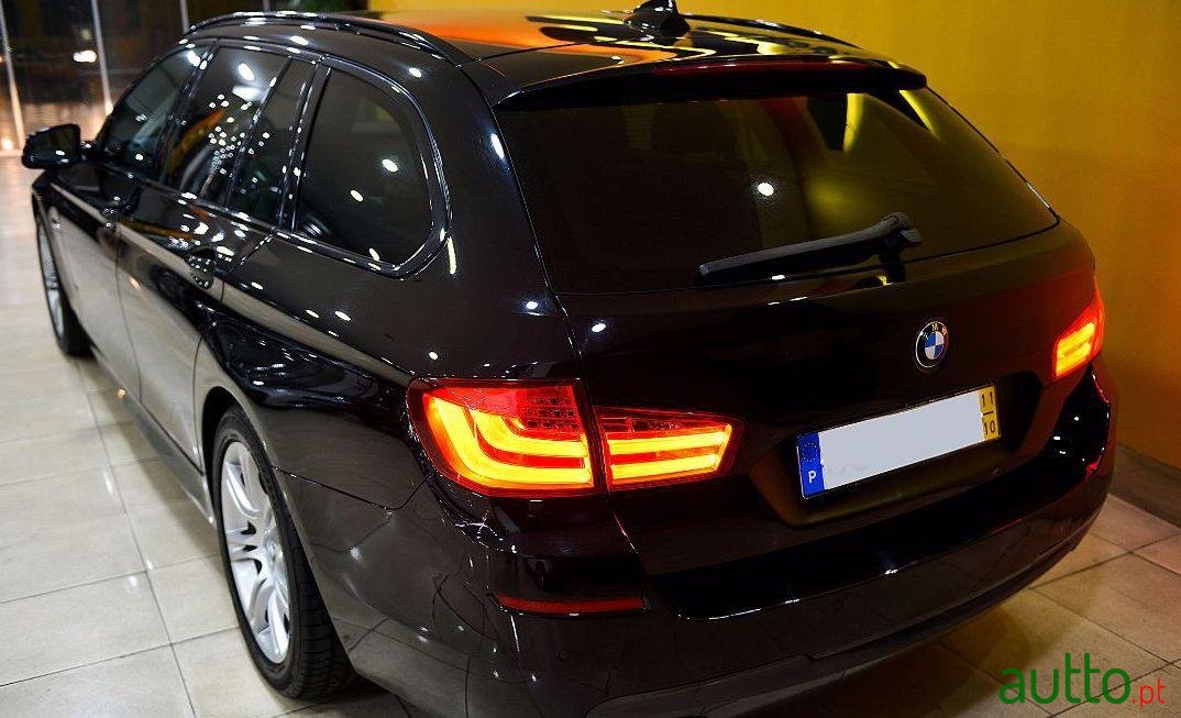 2011' BMW 520 Pack M photo #1