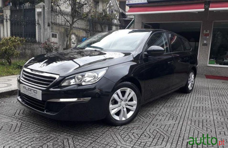 2014' Peugeot 308 Sw photo #1