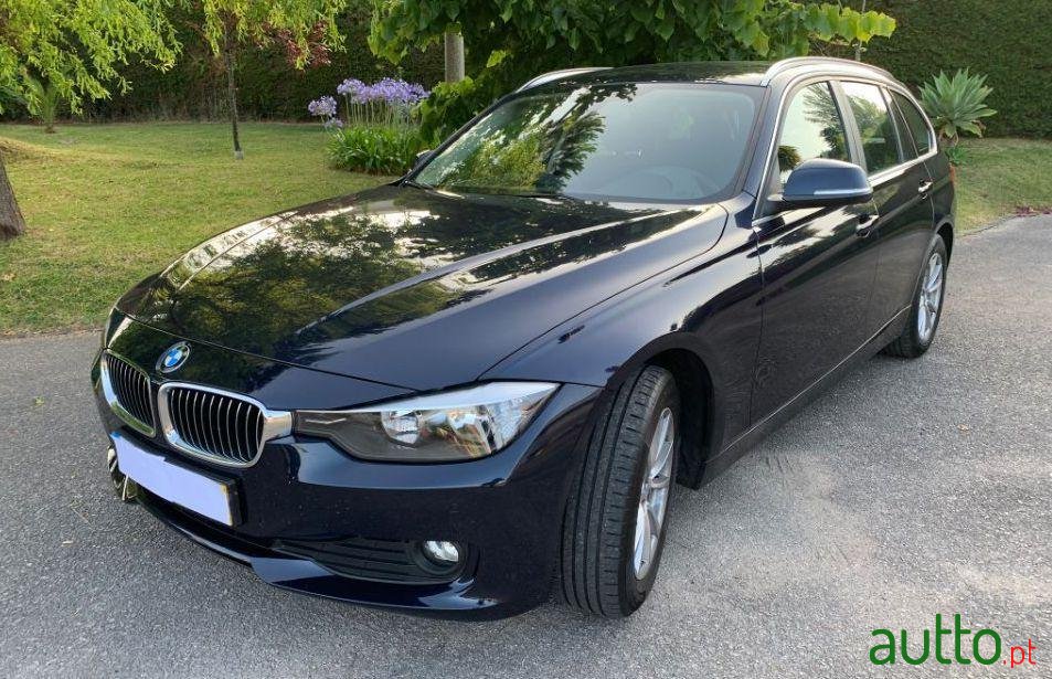 2015' BMW 318 photo #2