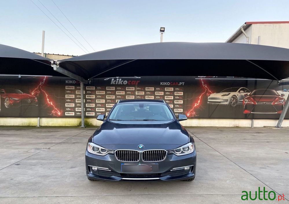 2014' BMW 318 photo #1