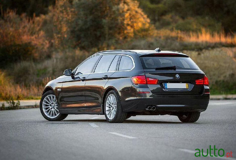 2011' BMW 520 photo #1