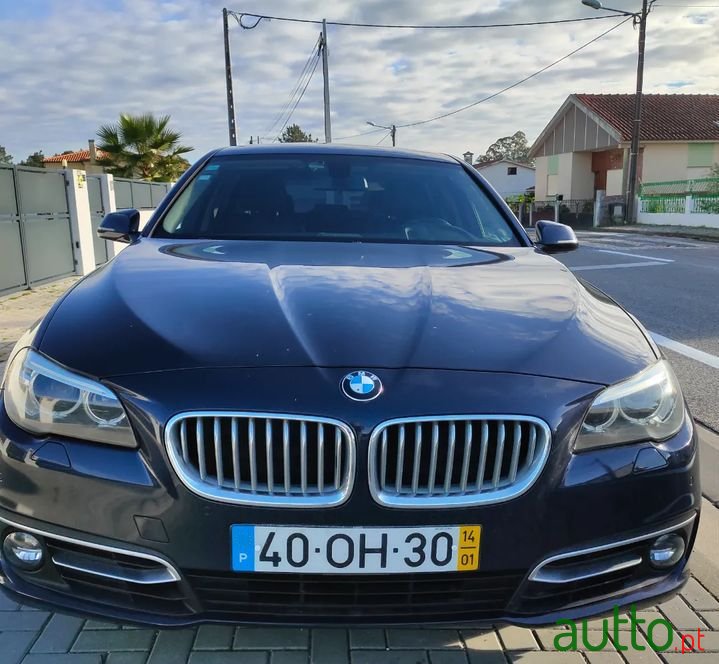2014' BMW 520 photo #1