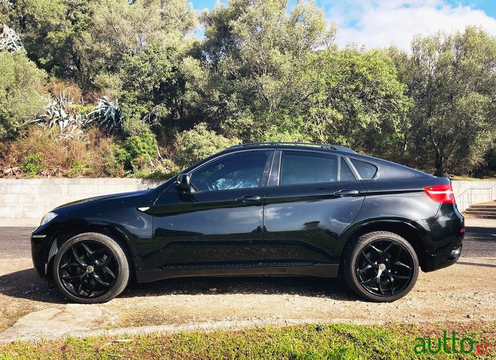 2009' BMW Série X Xdrive35D photo #4