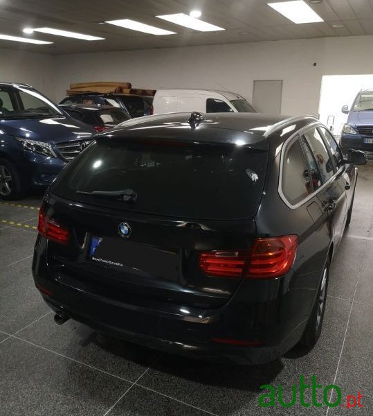 2014' BMW 318 photo #2