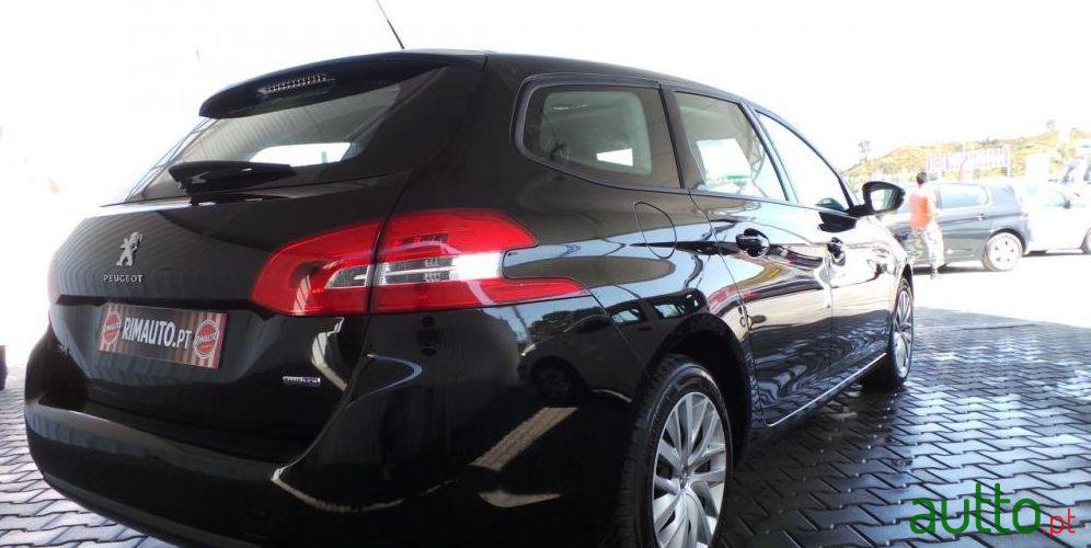 2014' Peugeot 308 Sw photo #1