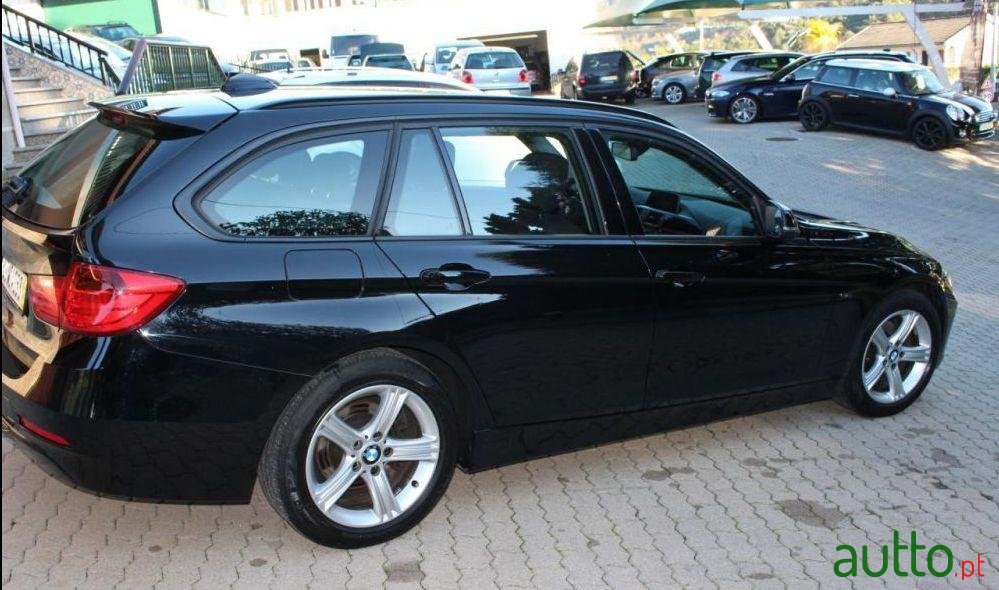 2013' BMW 320 D Touring Line Sport photo #2