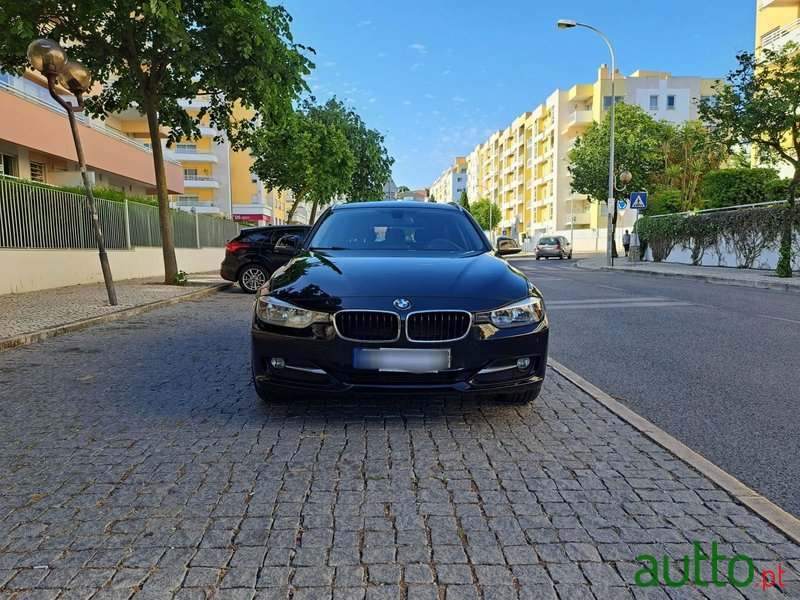 2013' BMW 318 photo #1