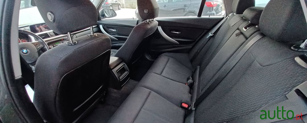 2013' BMW 316 photo #6