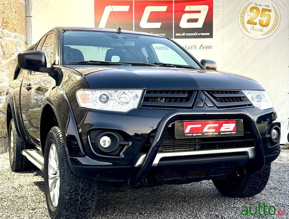 2014' Mitsubishi L200 photo #1