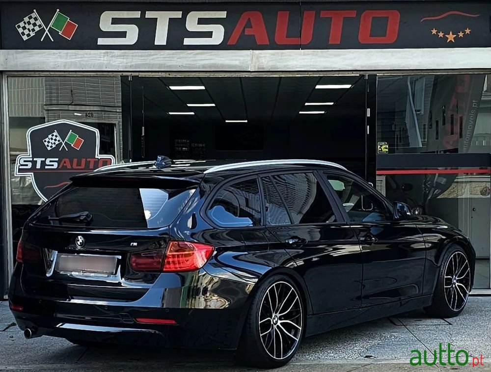 2013' BMW Série 3 D Touring photo #3