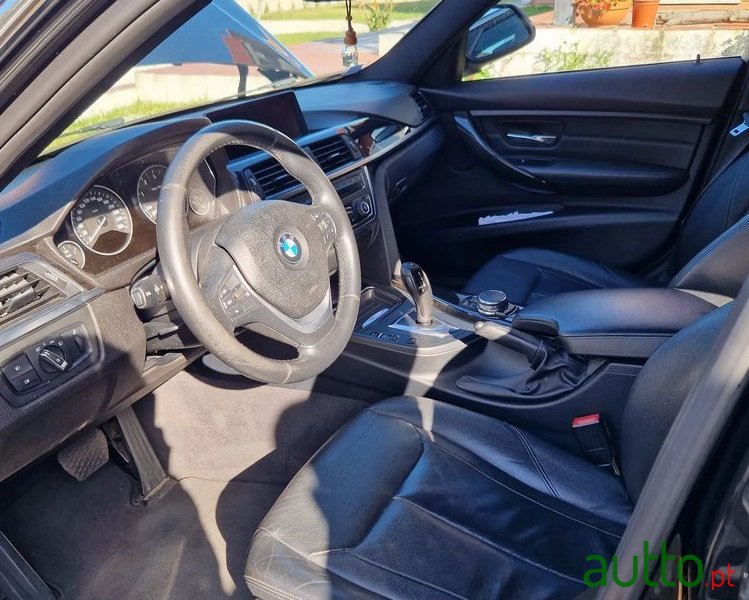 2015' BMW 318 photo #6