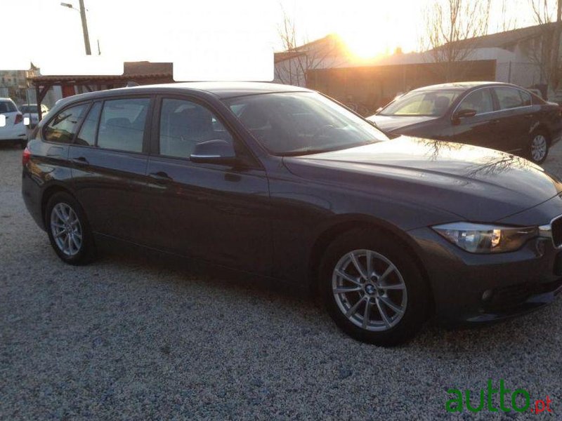 2012' BMW 320 D Touring Navigation photo #2