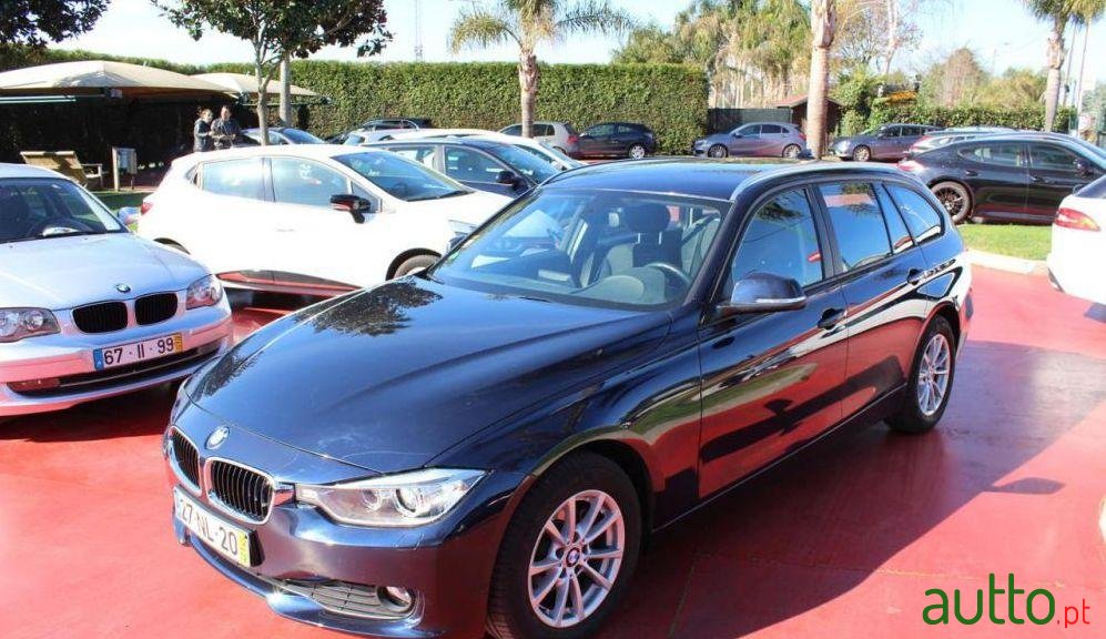 2012' BMW 318 D Touring photo #2