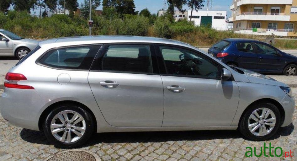 2014' Peugeot 308 Sw photo #1