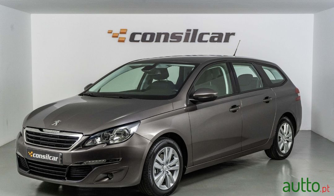 2014' Peugeot 308 Sw photo #1