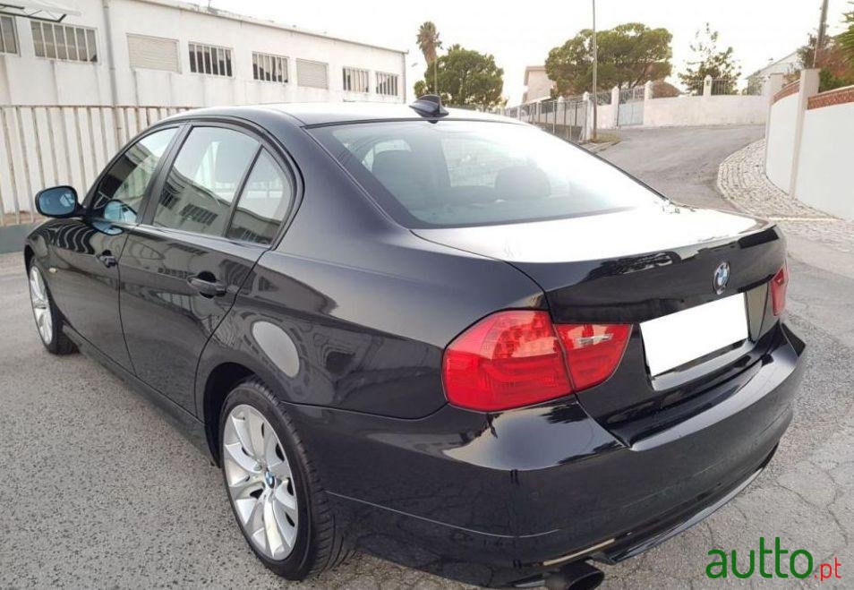 2009' BMW 318 photo #1