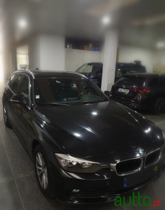 2014' BMW 318 photo #1