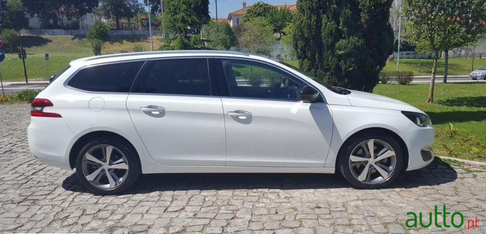 2014' Peugeot 308 Sw photo #1