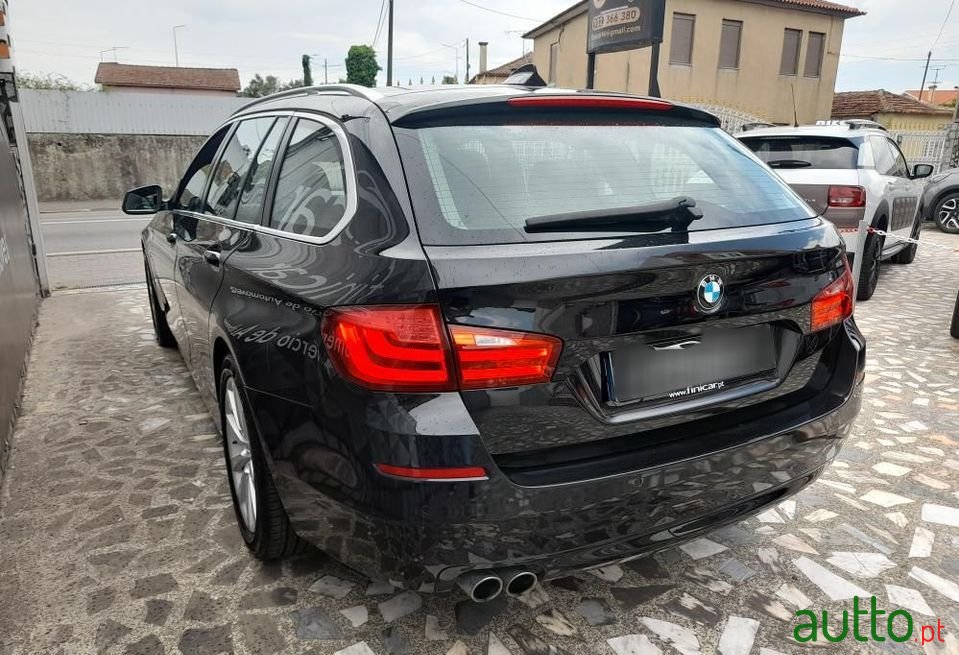 2010' BMW 520 photo #6