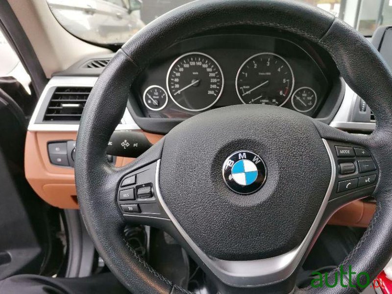 2015' BMW 318 D Touring Luxury photo #3