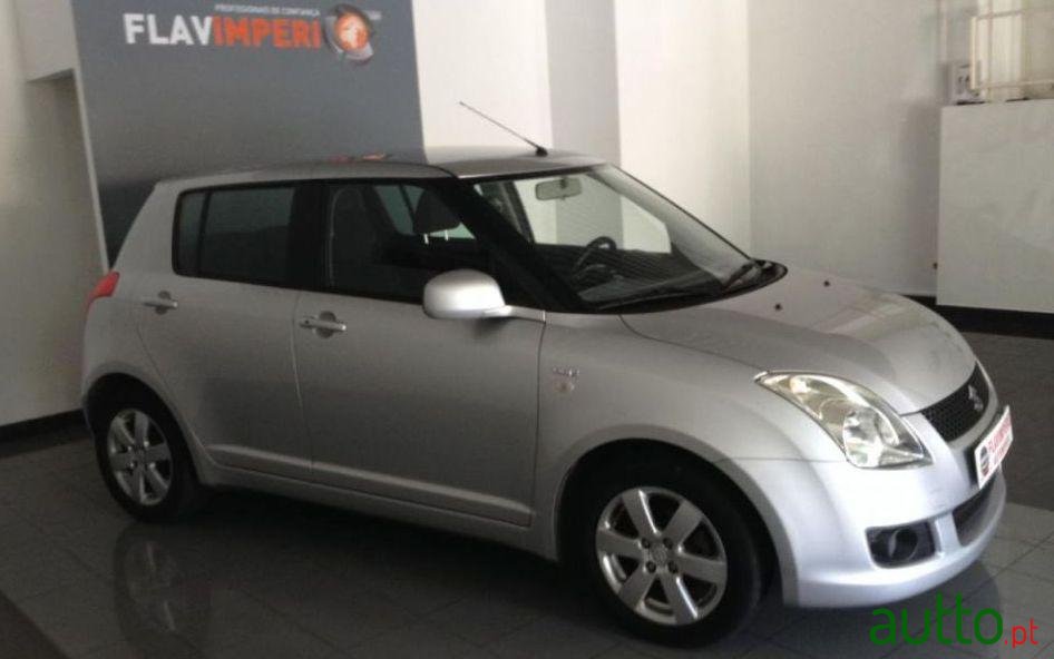 2009' Suzuki Swift 1.3 Ddis Glx photo #1