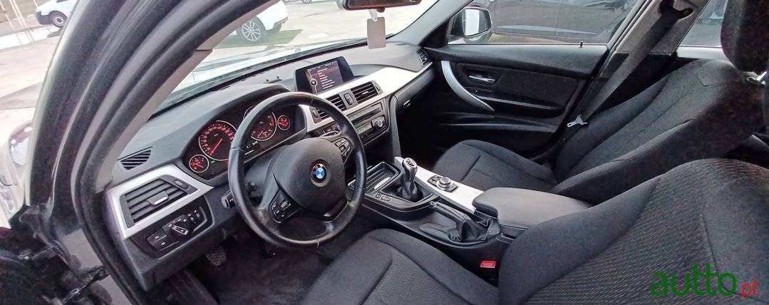 2013' BMW 316 photo #5