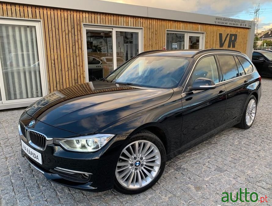 2015' BMW 318 photo #1