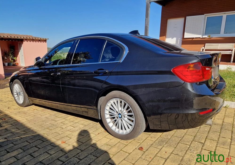 2015' BMW 318 photo #2