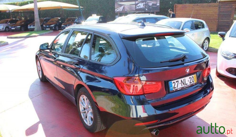 2012' BMW 318 D Touring photo #1