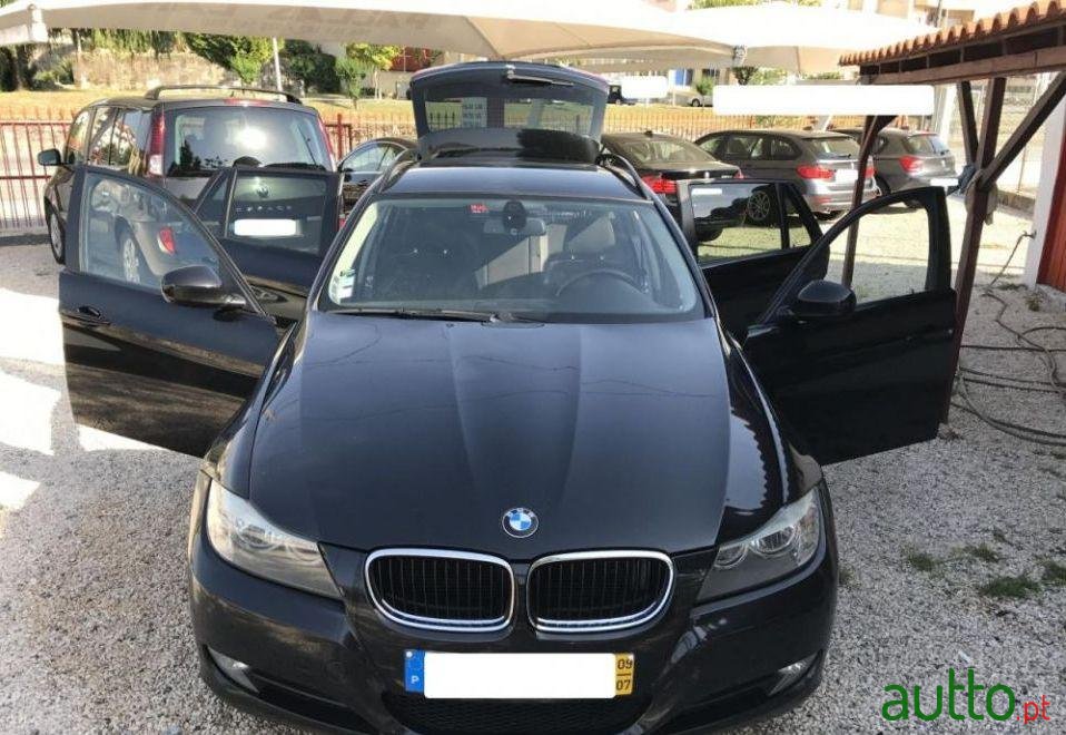 2009' BMW 320 D Touring Sport photo #1