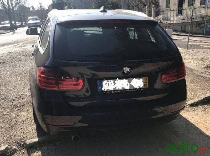 2015' BMW 318 Touring photo #1
