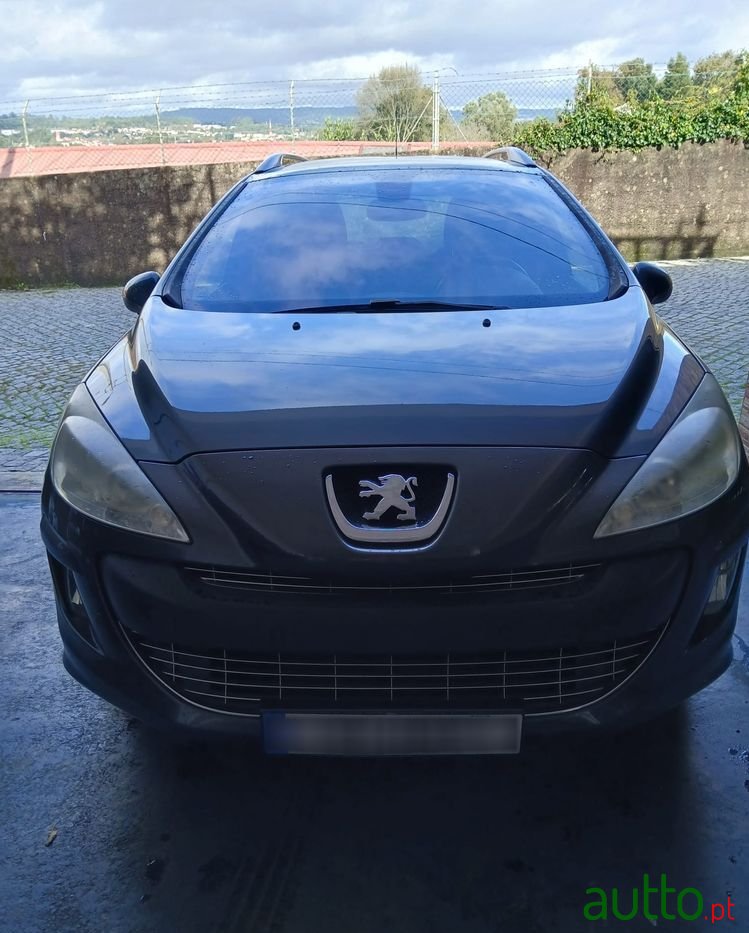 2010' Peugeot 308 Sw photo #1