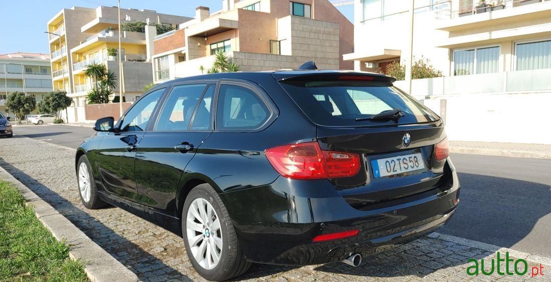 2013' BMW 318 photo #2