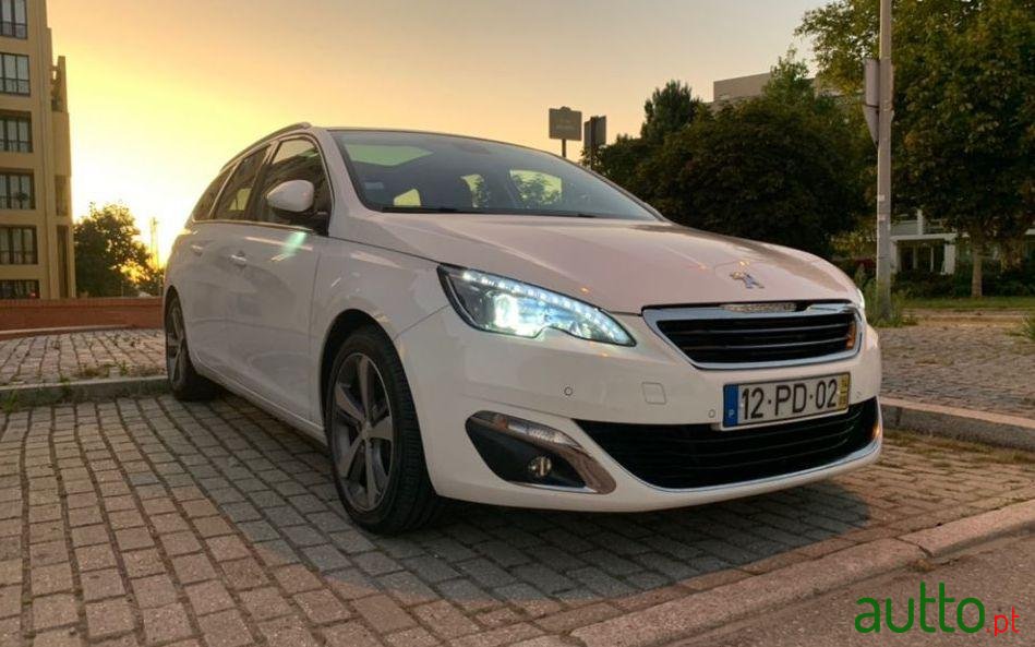 2014' Peugeot 308 Sw photo #1