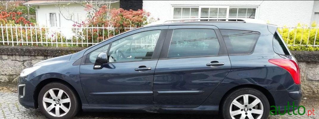 2011' Peugeot 308 Sw photo #1