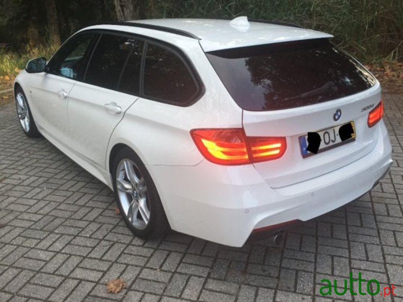 2014' BMW 320 D Touring Auto Pack M photo #1