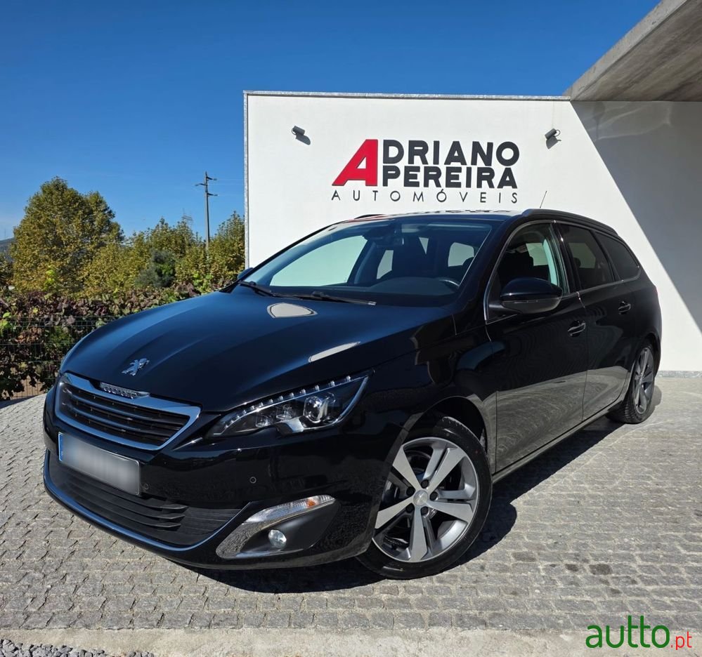 2014' Peugeot 308 Sw photo #1