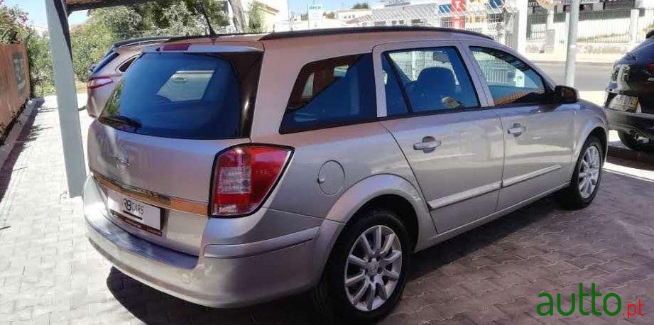 2008' Opel Astra Caravan photo #1