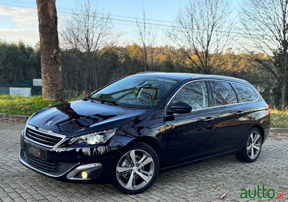 2014' Peugeot 308 Sw photo #1
