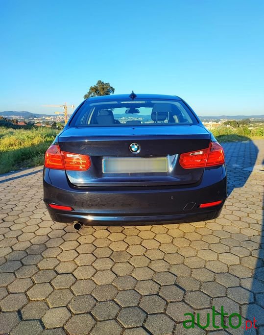 2014' BMW 318 photo #5