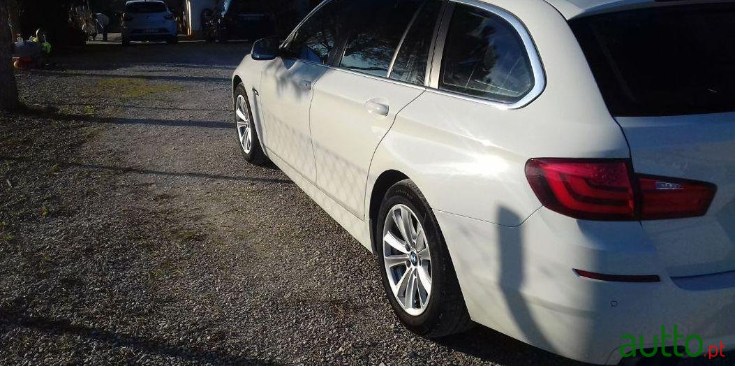 2012' BMW 520 photo #1