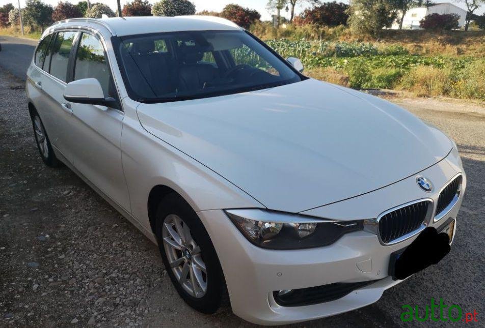 2014' BMW 318 D Touring photo #1