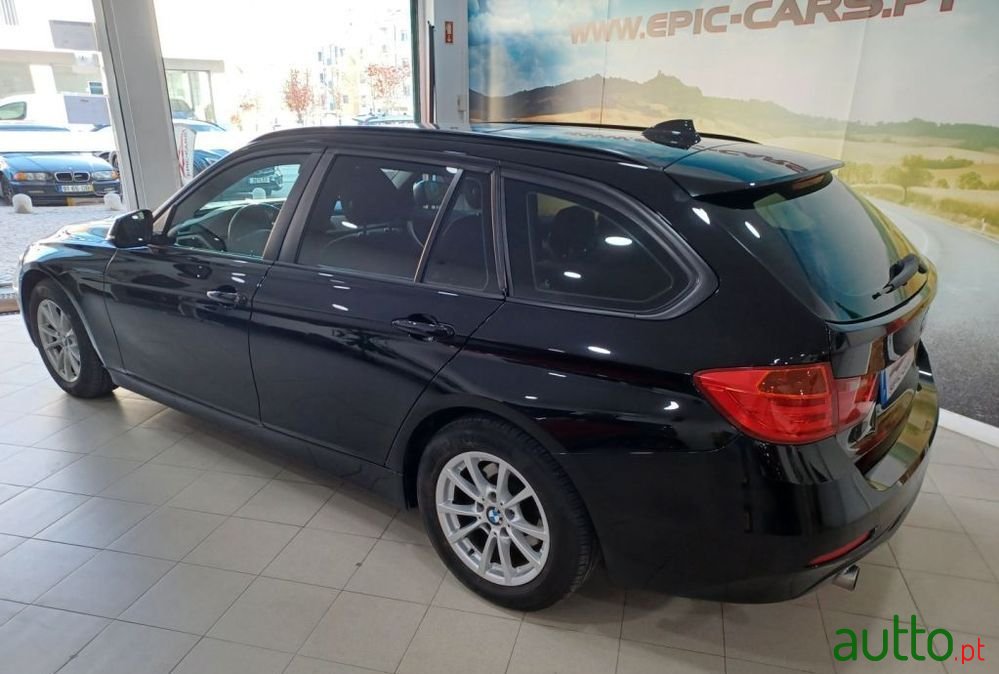 2013' BMW 318 D Touring Line Sport photo #4