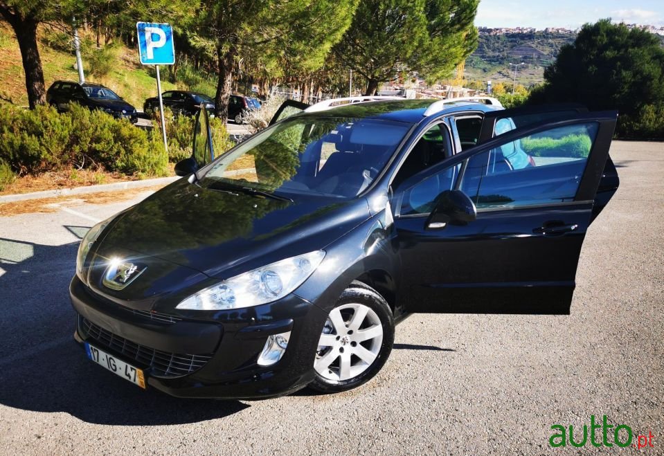 2009' Peugeot 308 Sw photo #1