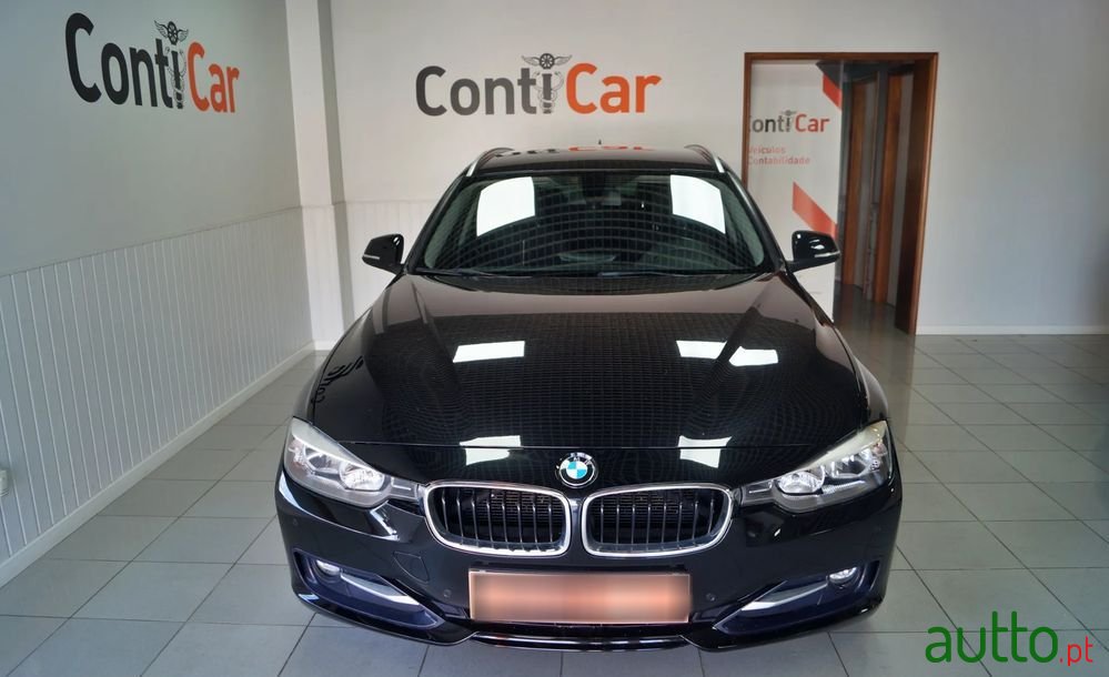 2014' BMW 318 D Touring Auto photo #2