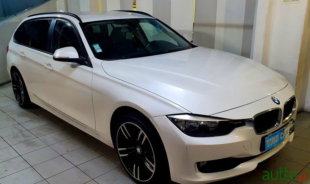 2013' BMW 318 photo #1