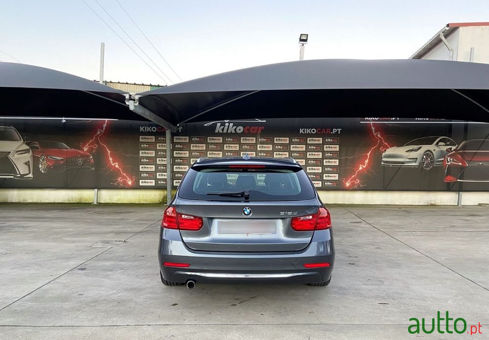 2014' BMW 318 photo #4